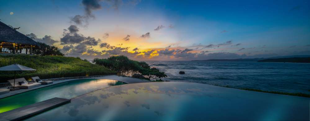 Haweri: Menara Villa pool & Haweri Main pool at sunset